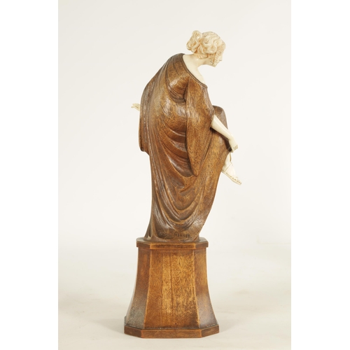 787 - LEONIE BOEHM-HENNES. AN ART NOUVEAU MIXED MEDIA WALNUT AND IVORY CARVED SCULPTURE OF A YOUNG LADY th... 