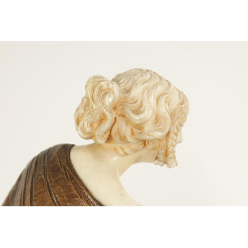 787 - LEONIE BOEHM-HENNES. AN ART NOUVEAU MIXED MEDIA WALNUT AND IVORY CARVED SCULPTURE OF A YOUNG LADY th... 