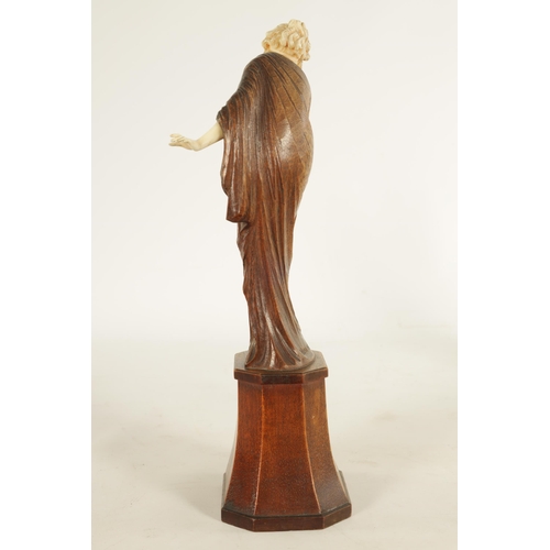 787 - LEONIE BOEHM-HENNES. AN ART NOUVEAU MIXED MEDIA WALNUT AND IVORY CARVED SCULPTURE OF A YOUNG LADY th... 