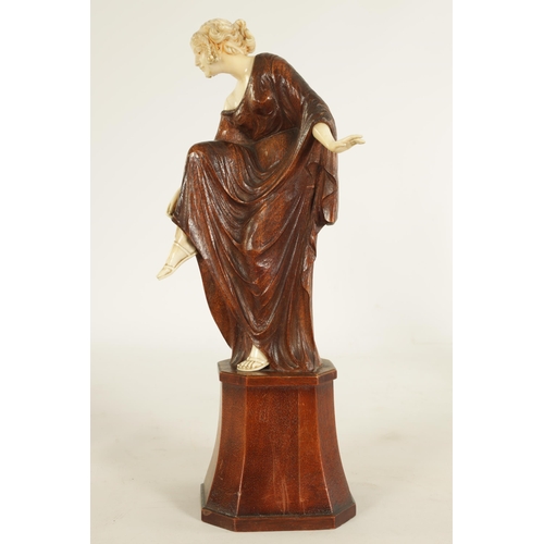 787 - LEONIE BOEHM-HENNES. AN ART NOUVEAU MIXED MEDIA WALNUT AND IVORY CARVED SCULPTURE OF A YOUNG LADY th... 