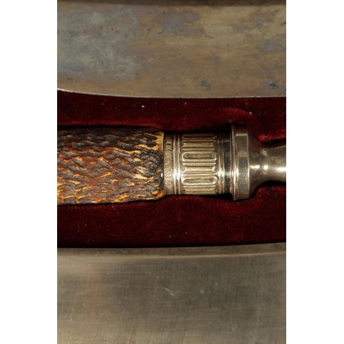 790 - A LATE 19TH CENTURY BOXED SILVER MOUNTED STAG HORN CARVING SET the inlaid oak case with velvet and s... 