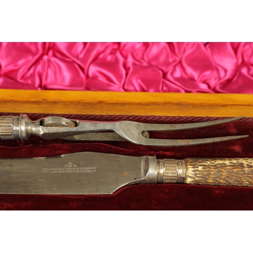 790 - A LATE 19TH CENTURY BOXED SILVER MOUNTED STAG HORN CARVING SET the inlaid oak case with velvet and s... 