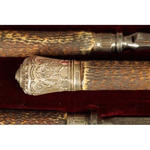 790 - A LATE 19TH CENTURY BOXED SILVER MOUNTED STAG HORN CARVING SET the inlaid oak case with velvet and s... 