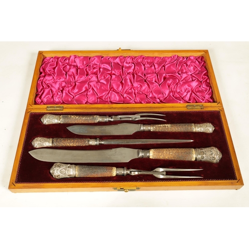 790 - A LATE 19TH CENTURY BOXED SILVER MOUNTED STAG HORN CARVING SET the inlaid oak case with velvet and s... 