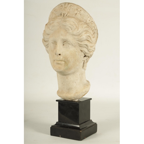 796 - AN INTERESTING 18TH CENTURY ITALIAN CARVED MARBLE HEAD OF A GODDESS mounted on a later black slate s... 