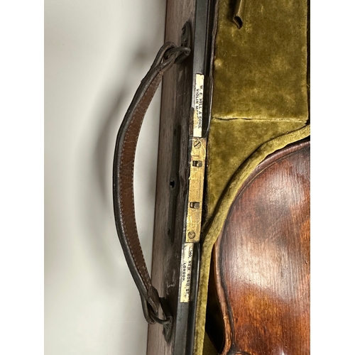 483 - AN 18TH CENTURY FULL-SIZE VIOLIN with a one-piece back together with two bows in a W.E. Hill & Sons ... 