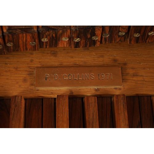 10 - A GOOD QUALITY PORTATIVE ORGAN made by P.D. Collins, the shaped oak frame with moulded edge containi... 