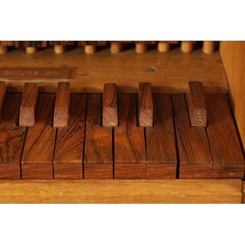 10 - A GOOD QUALITY PORTATIVE ORGAN made by P.D. Collins, the shaped oak frame with moulded edge containi... 