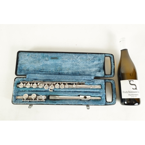 101 - A 20TH CENTURY YAMAHA SILVER METAL BOEHM FLUTE numbered YFL21S in a fitted case(67cm overall)... 