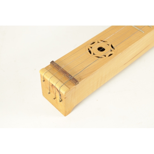 103 - A GERMAN MAPLE SCHEITHOLT an ancestor of the modern Zither, having four strings with pierced sound h... 