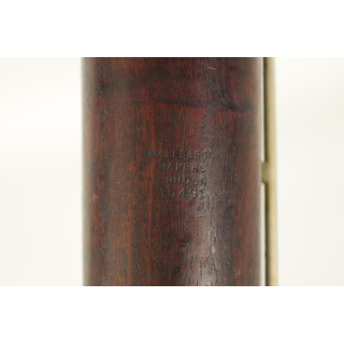 106 - AN EARLY 20TH CENTURY HAWKES & SON LONDON, EXCELSIOR SONORUS CLASS HARDWOOD BASSOON numbered 15491 L... 