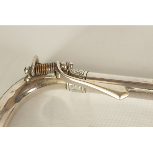 109 - A MID 20TH CENTURY SILVERED BRASS AND BRIGHT CUT MOUNTED CASED TROMBONE with engraved titled floral ... 