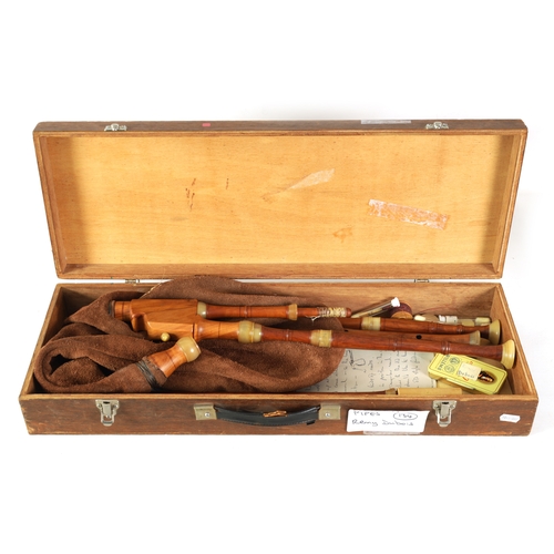 11 - A SET OF FLEMISH PIPES (BAGPIPES) turned in maple and horn with extra chanter and reeds, with suede ... 