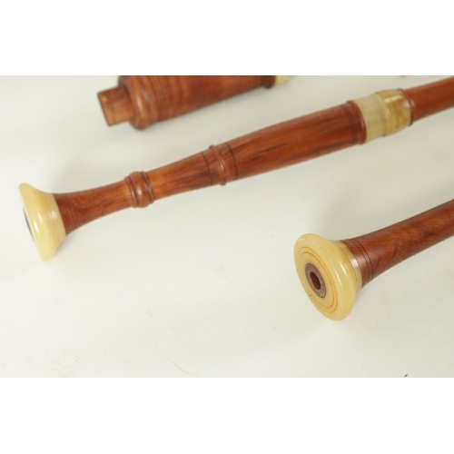 11 - A SET OF FLEMISH PIPES (BAGPIPES) turned in maple and horn with extra chanter and reeds, with suede ... 