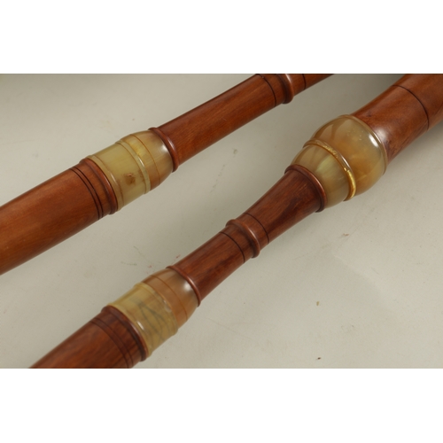 11 - A SET OF FLEMISH PIPES (BAGPIPES) turned in maple and horn with extra chanter and reeds, with suede ... 