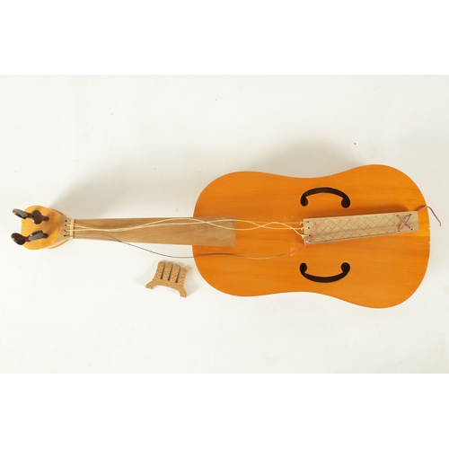 115 - A MEDIEVAL STYLE FIDDLE BY BERNARD ELLIS bearing makers label(60cm overall)