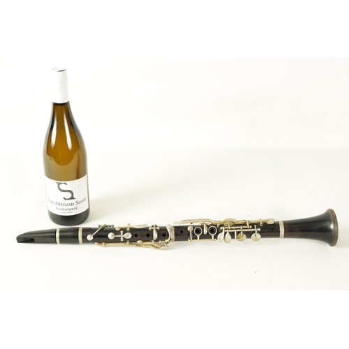 116 - A JEROME THIBOUVILLE-LAMY EBONY CLARINET with banded segmented body and all key fittings, missing mo... 