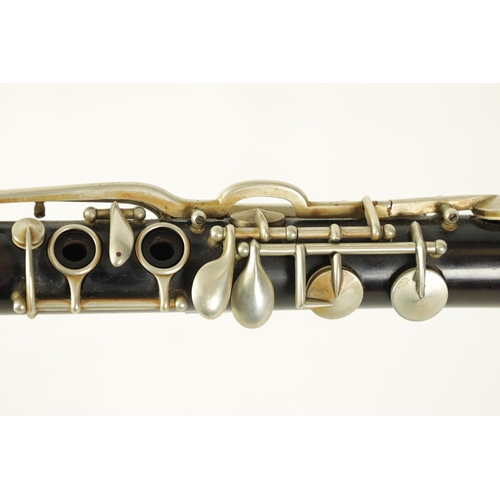 116 - A JEROME THIBOUVILLE-LAMY EBONY CLARINET with banded segmented body and all key fittings, missing mo... 