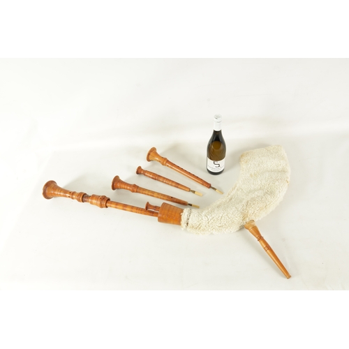 118 - A SET OF ITALIAN ZAMPOGNA DOUBLE CHANTERED BAGPIPES with sheepskin bag.(96cm overall)