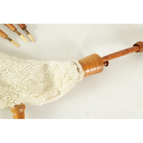 118 - A SET OF ITALIAN ZAMPOGNA DOUBLE CHANTERED BAGPIPES with sheepskin bag.(96cm overall)