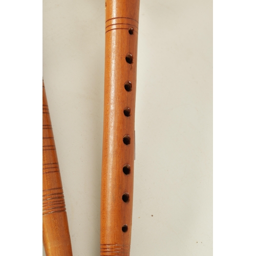 118 - A SET OF ITALIAN ZAMPOGNA DOUBLE CHANTERED BAGPIPES with sheepskin bag.(96cm overall)