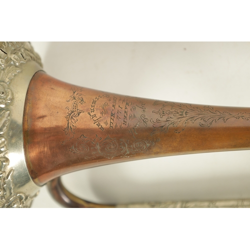 12 - A 19TH CENTURY BRASS, COPPER, AND BRONZE TRUMPET BY GEORGE SMITH with silvered embossed rococo mount... 