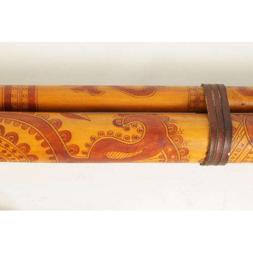 123 - A LARGE SLOVAKIAN FUJARA FLUTE With stained engraved decoration and dated 1972, together with matchi... 