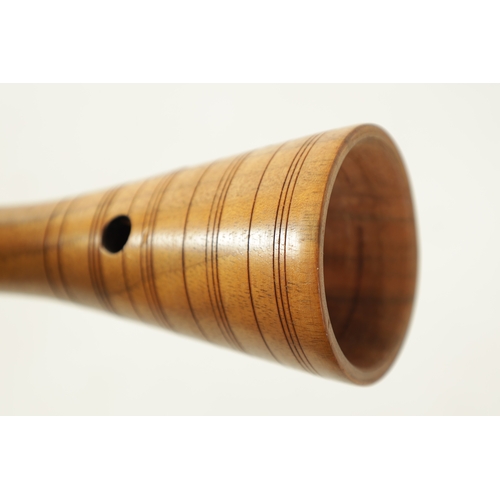 124 - THREE SHAWMS OF VARIED DESIGN comprised of an ebonised ringed design, a plain design double reed, al... 