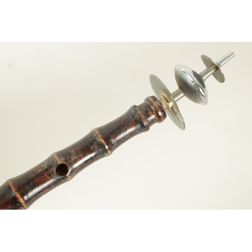 125 - A CHINESE SHAWM with a simulated bamboo stem with pagoda-type mouthpiece having 8 finger holes(31cm ... 