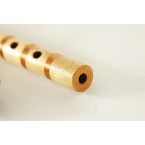 126 - A MOECK SOPRANO RENAISSANCE STYLE RECORDER TOGETHER WITH A COPPER WIRED PIPE AND A HARDWOOD BAGPIPES... 