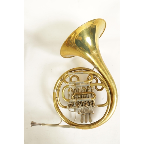 136 - A 20TH CENTURY WELTKLANG BRASS AND SILVERED FRENCH HORN engraved to the bell 