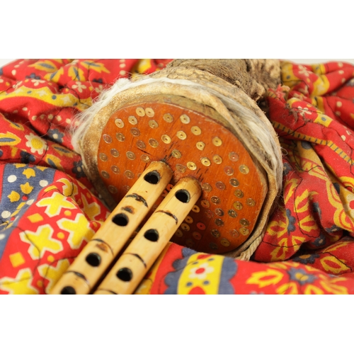 137 - A SET OF MIZOUED TUNISIAN BAGPIPES with horn pipes and leather bag.(39cm overall)