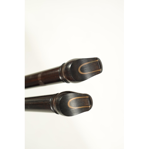 17 - TWO ROSEWOOD GALOUBETS of tapering form each with three holes - Galoubets are designed to be played ... 