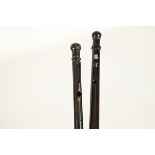 17 - TWO ROSEWOOD GALOUBETS of tapering form each with three holes - Galoubets are designed to be played ... 