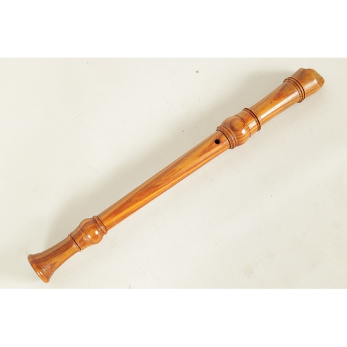 18 - A FEHR TREBLE RECORDER, possibly in bubinga wood, in fleece lined case(47cm overall)