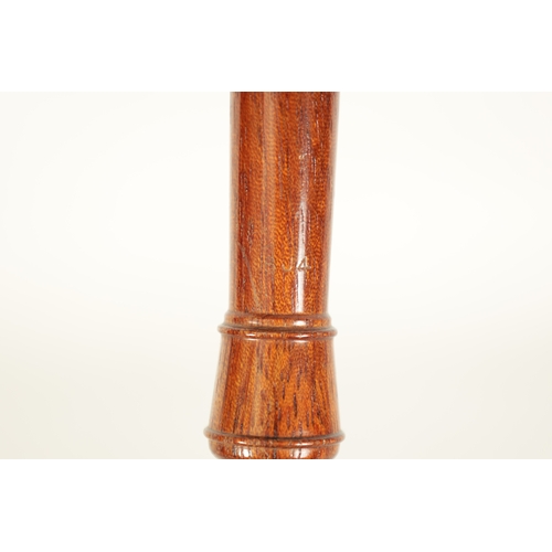 19 - A TWO SECTION KUNG SOPRANINO RECORDER turned in olive wood with impressed makers mark - in cord case... 