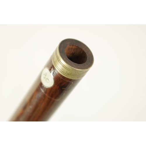 25 - A MILITARY TWO PIECE ‘GUARDS MODEL’ FLUTE Turned in rosewood with nickel mounts and key, impressed m... 