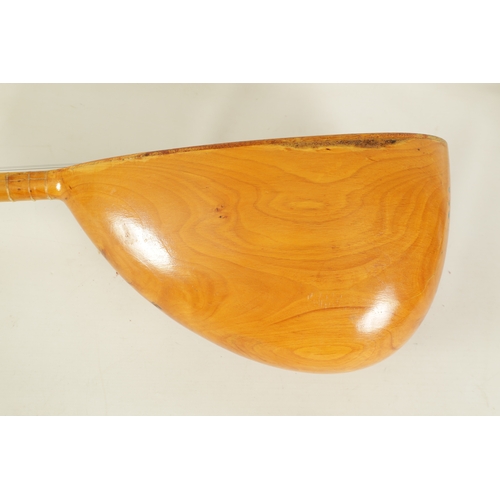 26 - A TURKISH SAZ with long finger board and shaped neck(118cm overall)