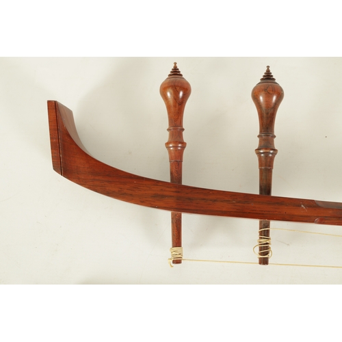 37 - A SAW DUANG TWO STRING THAI FIDDLE WITH BOW the turned neck with quadrant end and baluster tuning pe... 