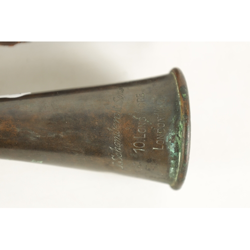 41 - A LEATHER CASED HUNTING HORN BY J. SCHOMBERG & SONS, LONDON having a seemed copper body with nickel ... 