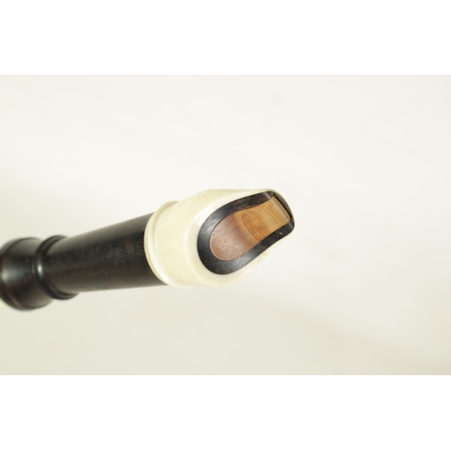 50 - A GOOD QUALITY HANS COOLSMA ALTO RECORDER fitted an ivory mouthpiece and turning on a rosewood body,... 