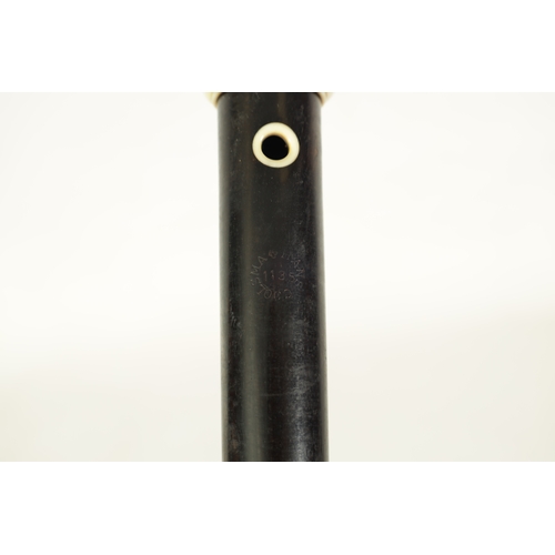 50 - A GOOD QUALITY HANS COOLSMA ALTO RECORDER fitted an ivory mouthpiece and turning on a rosewood body,... 