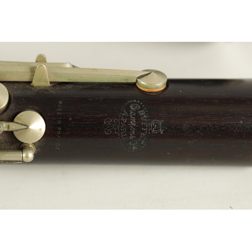 54 - TWO EARLY 20TH CENTURY BUFFET CLARINETS turned in ebony with nickel buttons and impressed makers mar... 