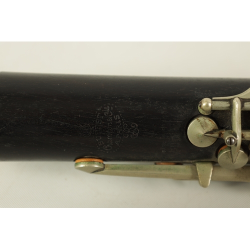 54 - TWO EARLY 20TH CENTURY BUFFET CLARINETS turned in ebony with nickel buttons and impressed makers mar... 