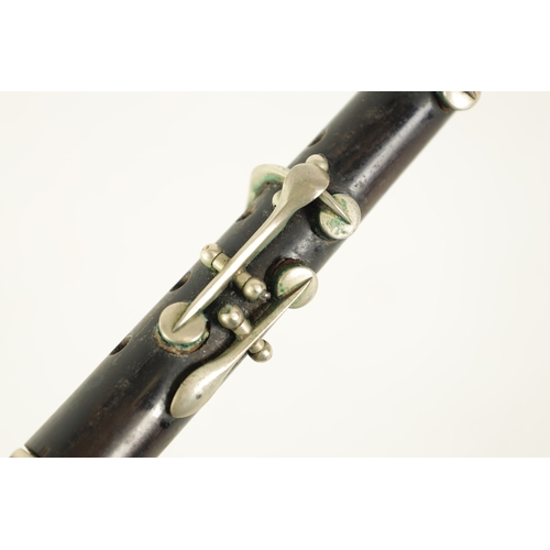 62 - A THREE PIECE SPANISH MINERVA MILITARY PICCOLO turned in rosewood with nickel mounts and keys, impre... 