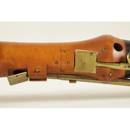 72 - A 19TH CENTURY BOXWOOD AND EBONY CLARINET BY LEONHARDT with brass keys and impressed makers marks(58... 