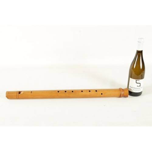 73 - A JOHN COUSEN TENOR RECORDER turned in maple with impressed makers marks(61.9cm long)