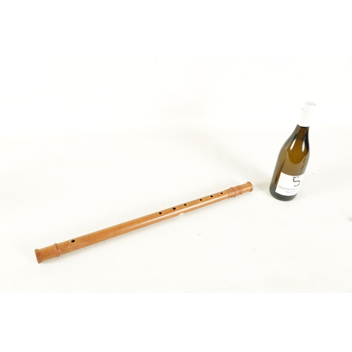 76 - A CARL HANSON FLUTE finely turned in maple with dogtooth carved decoration and impressed makers mark... 