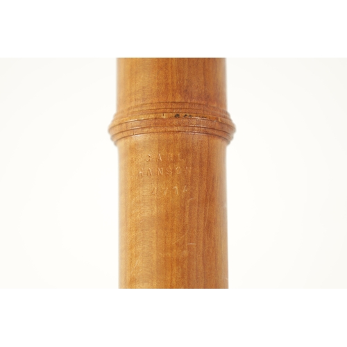 76 - A CARL HANSON FLUTE finely turned in maple with dogtooth carved decoration and impressed makers mark... 