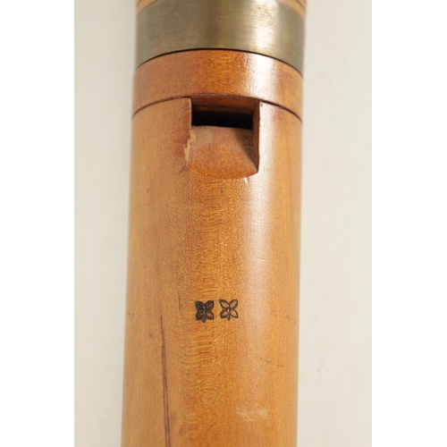 77 - AN EARLY BASS RECORDER BY JOHN COUSEN turned in maple with brass collars and pierced barrel shaped c... 